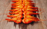 Boiled shrimps on wooden table
