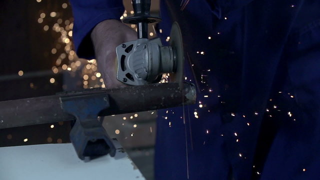 Cutting metal with rod cutter shot in slow motion