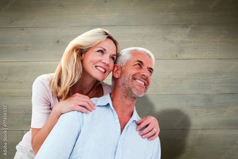 Aufkleber composite image of smiling couple embracing and looking