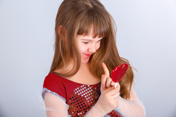 girl  holding a lollipop valentines day