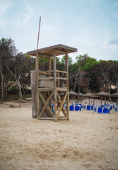 Empty lifeguard tower on the beach.
