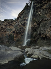 Obraz premium Landscape with a waterfall