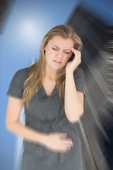 Fototapeta premium Composite image of woman with stomach ache