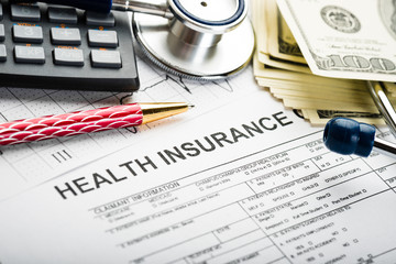 Health care costs. Stethoscope and calculator symbol for health