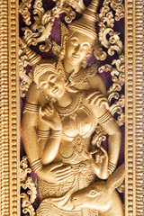 Religious carvings on the doors, Luang Prabang