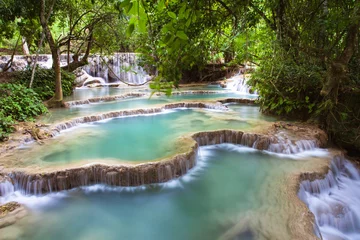 Fotobehang Kuang Si Waterfalls, Luang Phrabang, Laos. © Elena Ermakova
