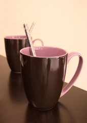 cup of coffee on wooden table