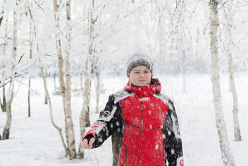 Fototapeta premium Teenager boy in winter park