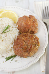 meatballs with rice on white plate