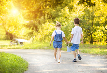 Little boy and girl on a walk