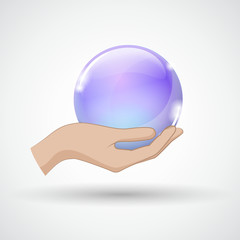 hand hält glaskugel