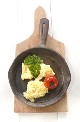 scrambled eggs and roasted tomato