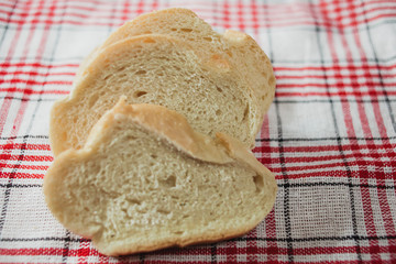 white bread on red - white tablecloth