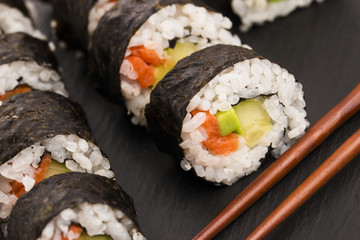 Salmon rolls served on a plate