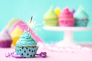 Fotobehang Cupcake with sparkler © Ruth Black