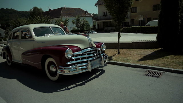 Oldtimer standing at the side of the road before driving off