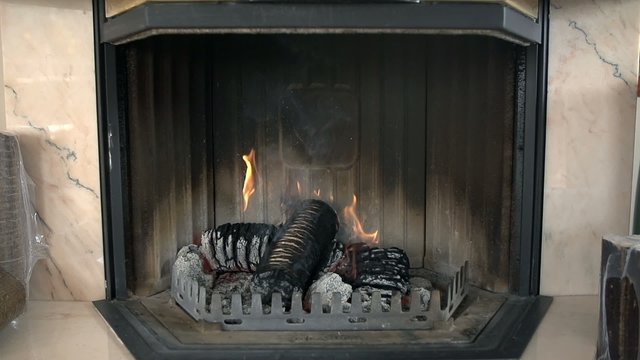 Fireplace with burning briquettes