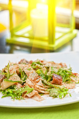 Salad with smoked eel