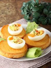 Egg stuffed with pepper, chives, mayonnaise
