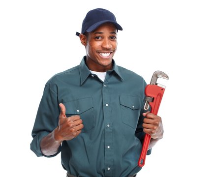 Plumber with wrench isolated white background.