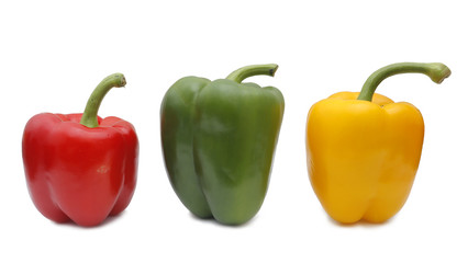 Composition with three peppers on white background