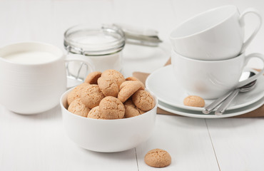 Amaretti Biscuits. Kitchenware. White Wooden Table