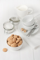 Amaretti Biscuits. Kitchenware. White Wooden Table