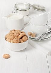 Amaretti Biscuits. Kitchenware. White Wooden Table