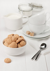Amaretti Biscuits. Kitchenware. White Wooden Table