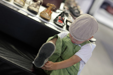Child trying on shoes