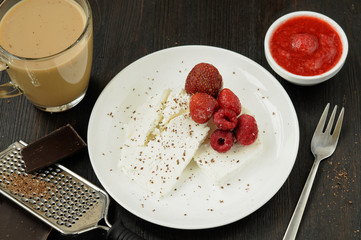 Cottage cheese with fresh berries and coffee with milk for break