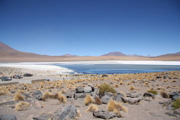 Atacama Desert stone landscape and lagoon in Uyuni