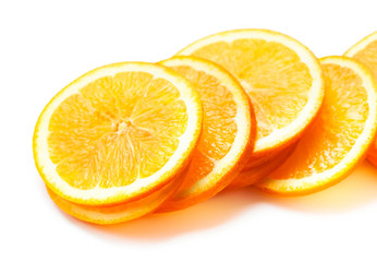 Slices of fresh orange fruit  isolated on white background close