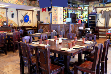 The interior of the restaurant in the old Russian style