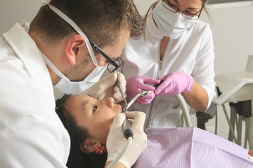 A dental office with employee and client