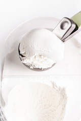Vanilla ice cream scoop closeup. White  Ice Cream Background