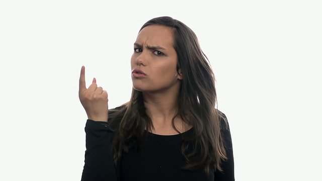Woman angry and displeased on white background