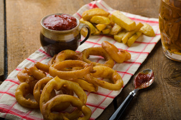 Onion rings, hot dip, french fries and Czech beer