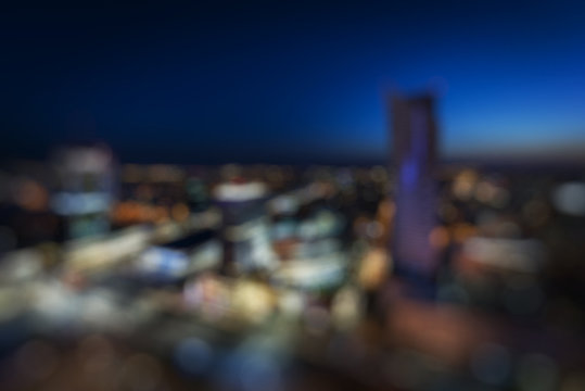 Fototapeta Blured panorama of Warsaw downtown during the night