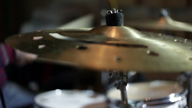 close up shot of musican playing drums