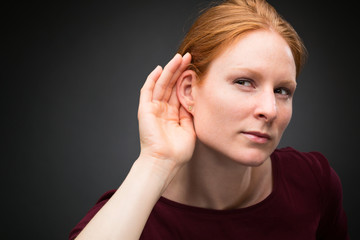 Curious Woman Listens to Rumors