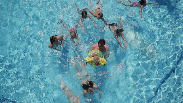 Crane shot of big family with a lot of kids