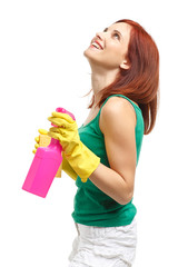 Obraz premium Young woman with spray bottle and sponge.