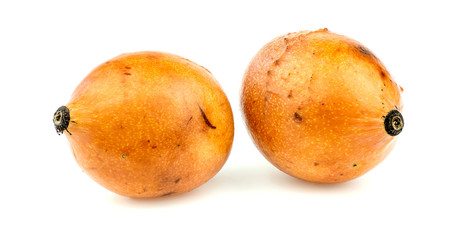 Pair of achacha fruits isolated on white background