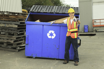 A worker who recycling thing on recycle center