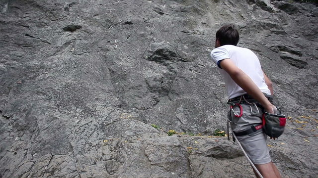 HD1080p: Man preparing for rock climbing in beautyful nature