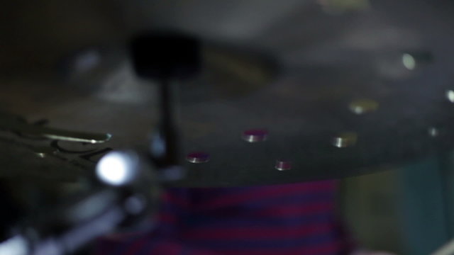close up shot of musican playing drums