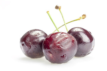 Three cherry berries isolated on white background