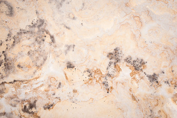 a brown marble wall