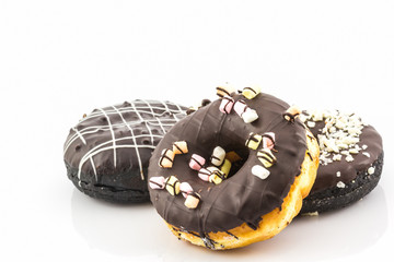 Chocolate donut with Sprinkles .